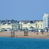 The buildings of the western part of Brighton seafront (and just into Hove), seen from the Palace Pier. Visible from left to right are, among others, Adelaide Crescent, Brunswick Terrace, Embassy Court and the Norfolk Hotel.
