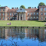 View of The Vyne, a sixteenth century Grade II listed building owned by National Trust, taken from across the lake.