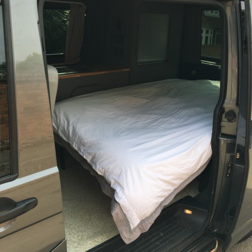 A VW T5 Campervan called Maple and Night setup for hire