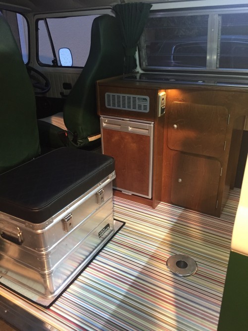 A VW T2 Classic Campervan called Wild-Monty and Funky Interior with storage boxseat for hire in Colyford, Devon