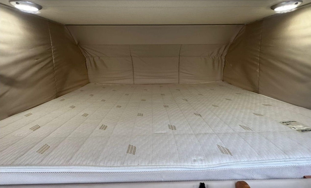 A Hymer Motorhome called Ellen-Mae and King size drop down bed for hire 