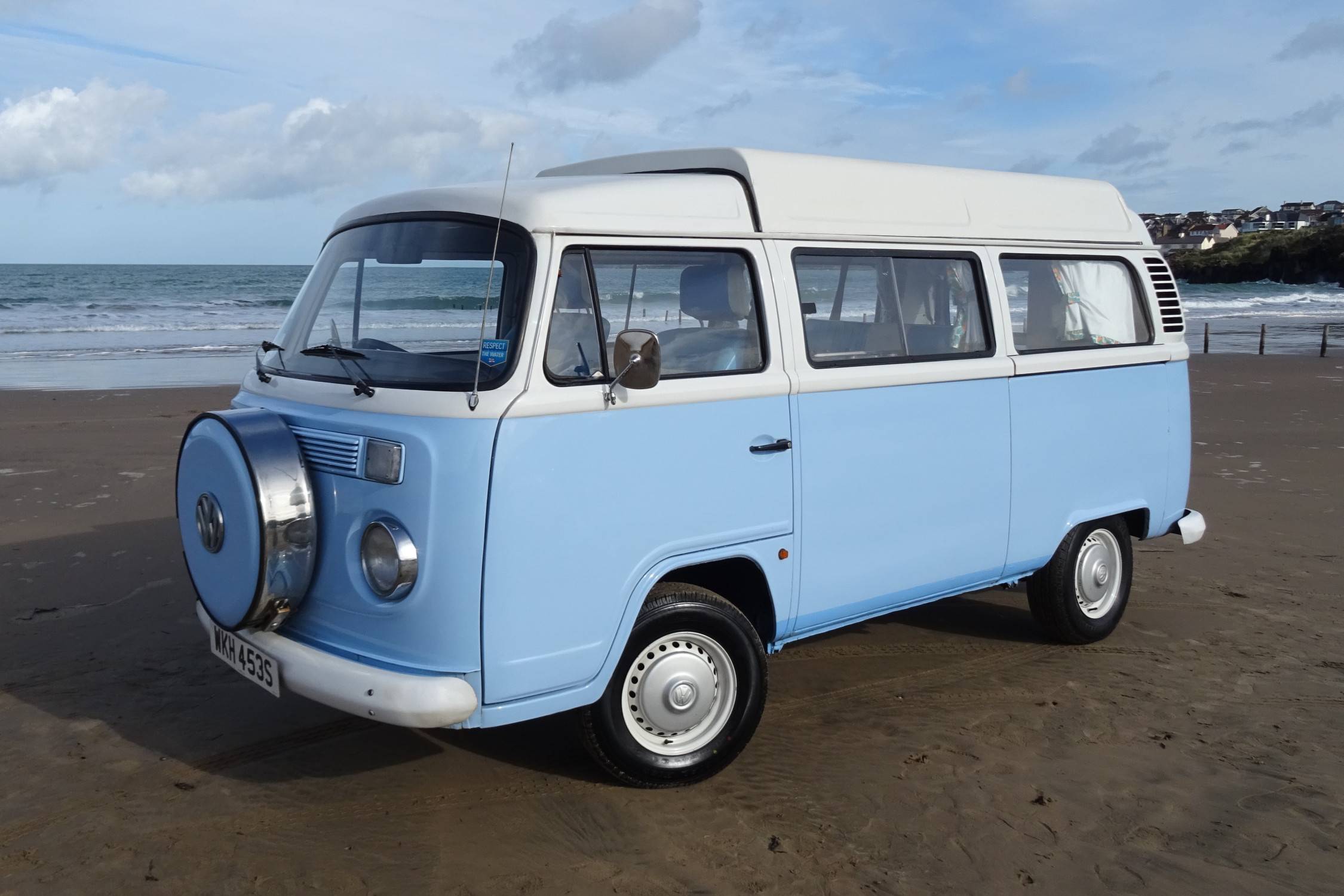 A VW T2 Brazilian Campervan called Flo and Fun on the beach for hire in Portstewart, Derry