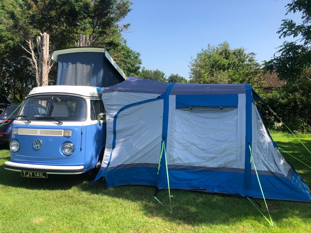 A  Campervan called Tilly-the-Camper and Awning that is available upon request for hire 