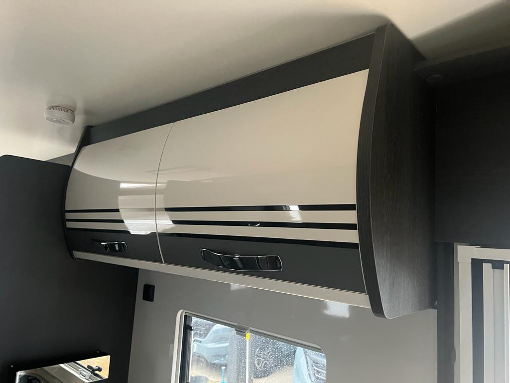 A OverCab Motorhome called panda and for hire in Sittingbourn, Kent