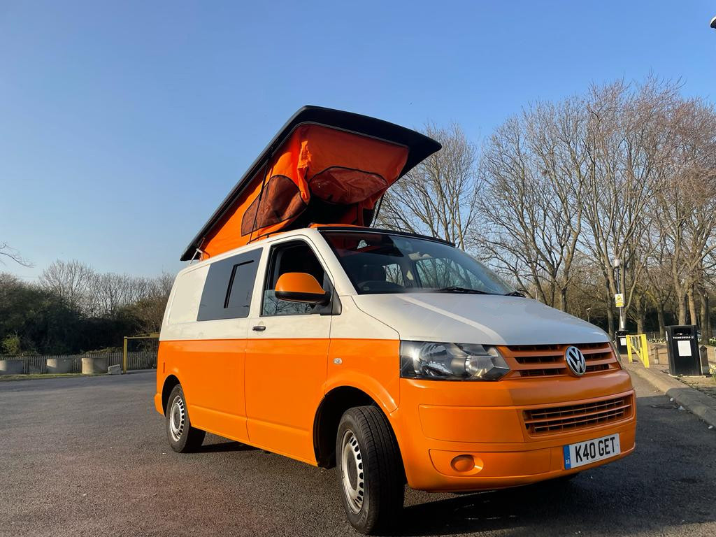 A VW T5 Campervan called Orangey and for hire in London, England