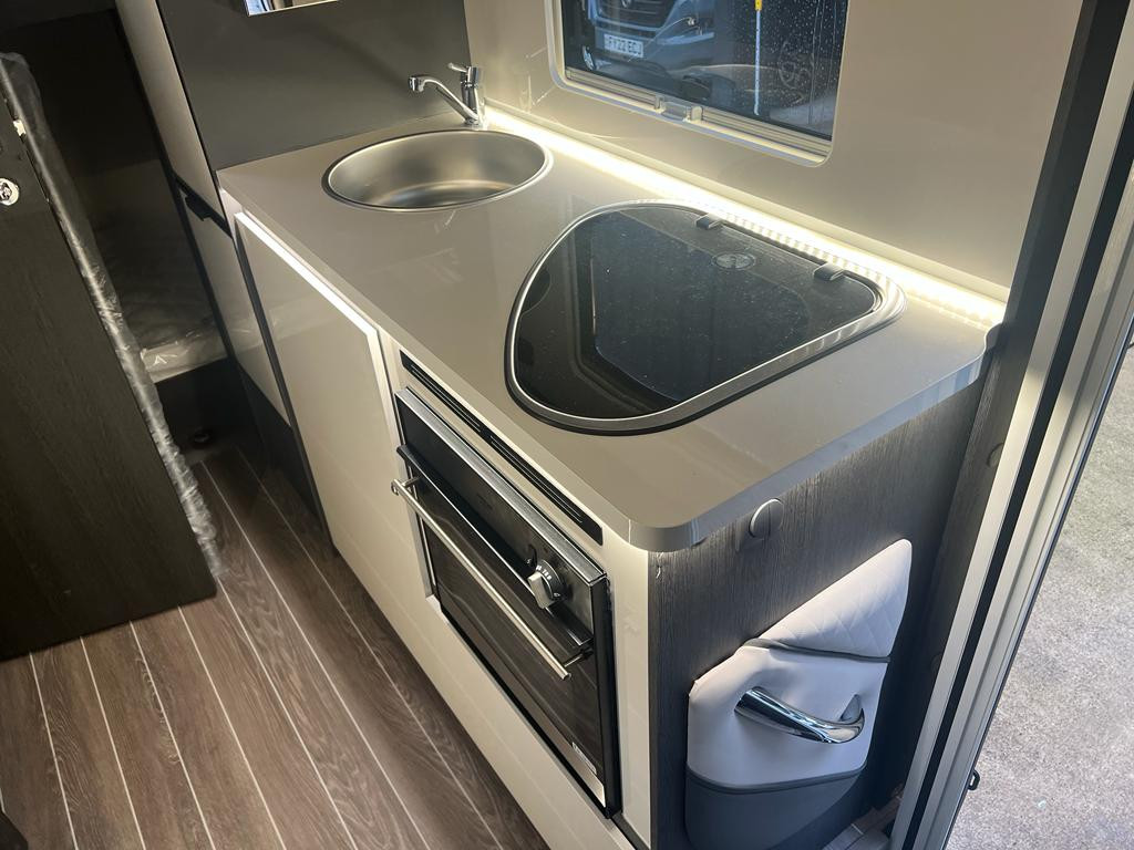 A OverCab Motorhome called panda and for hire in Sittingbourn, Kent