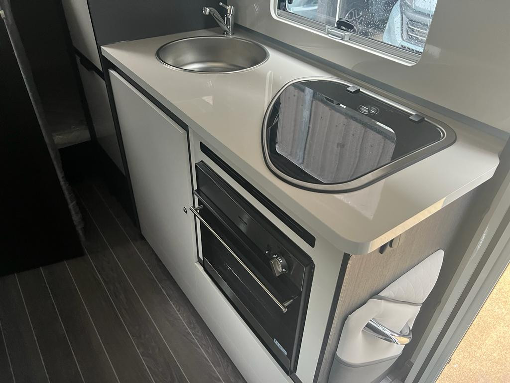 A OverCab Motorhome called panda and for hire in Sittingbourn, Kent