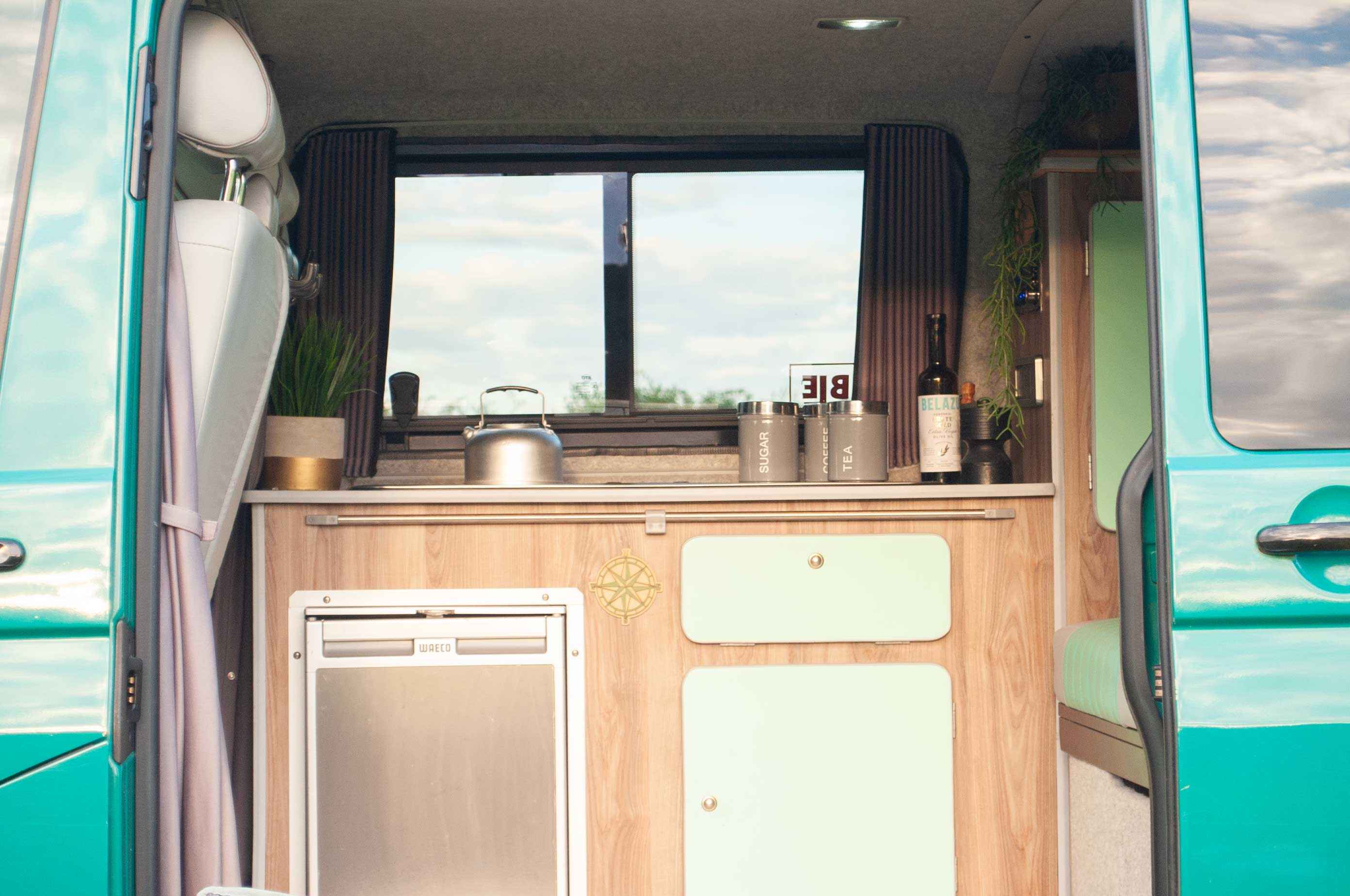 A VW T5 Campervan called Pretty-Green and for hire in Hickstead, West Sussex