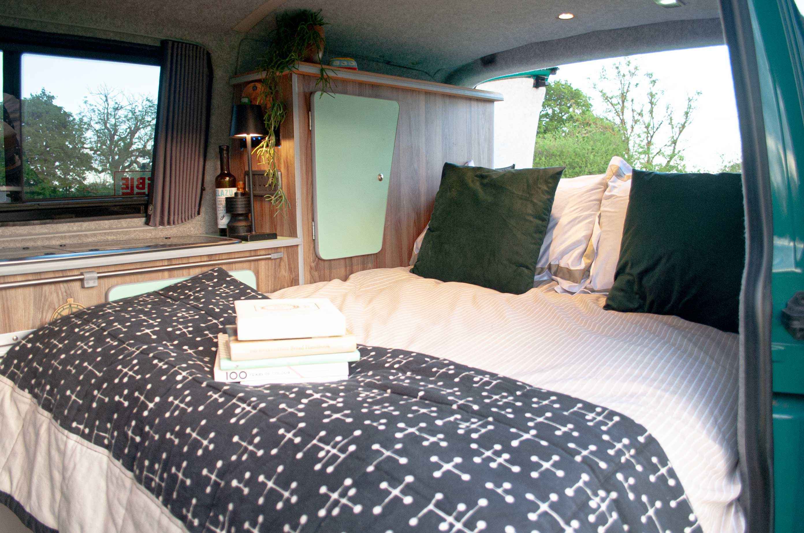 A VW T5 Campervan called Pretty-Green and for hire in Hickstead, West Sussex
