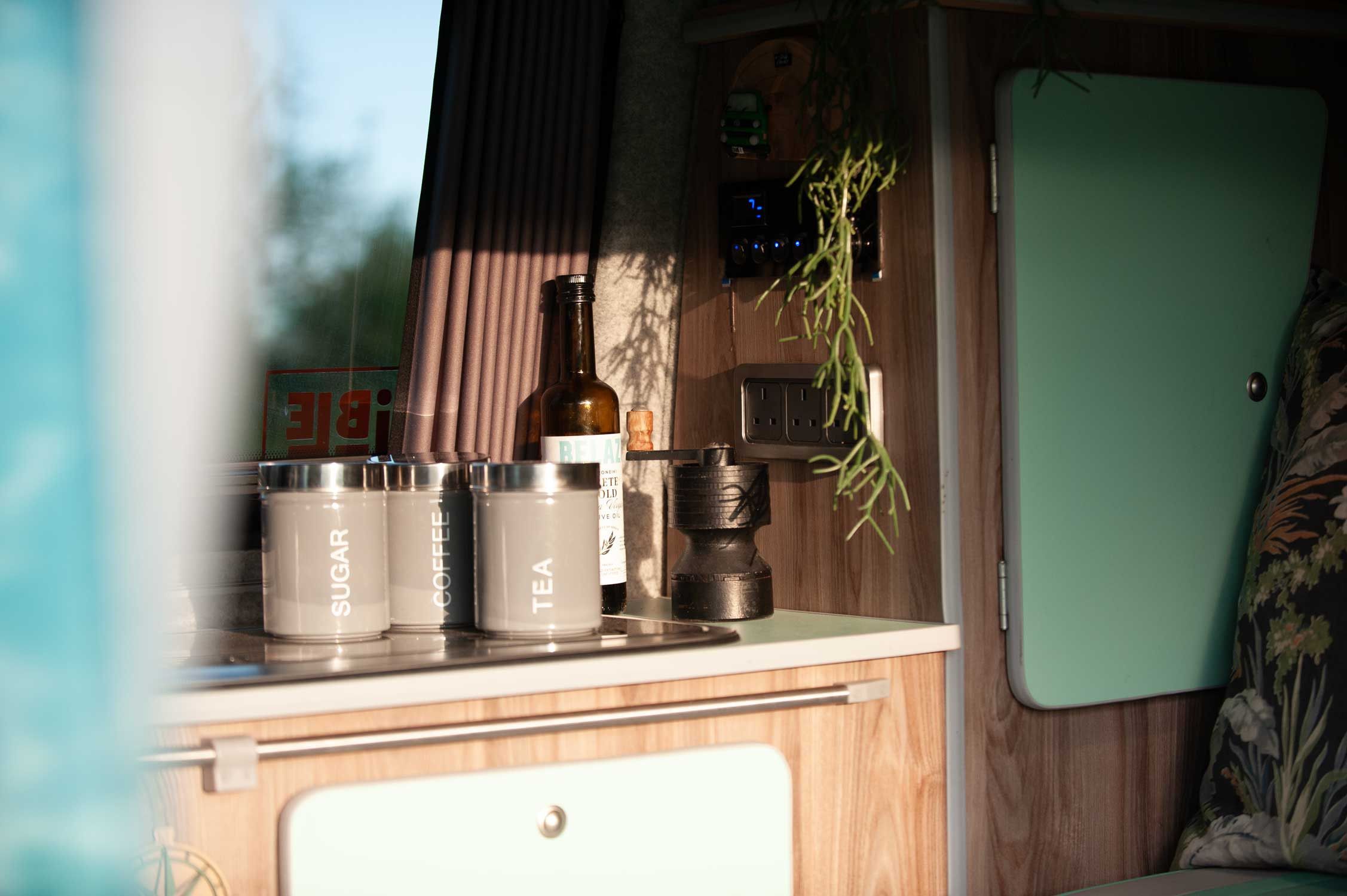 A VW T5 Campervan called Pretty-Green and for hire in Hickstead, West Sussex