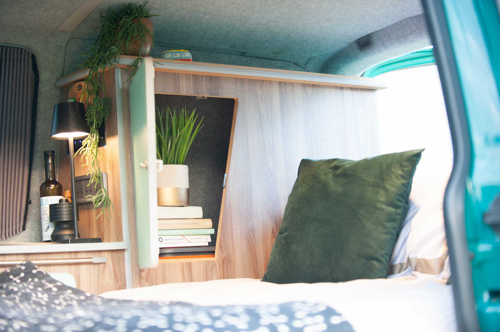 A VW T5 Campervan called Pretty-Green and for hire in Hickstead, West Sussex