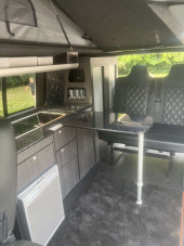 A VW T6 Campervan called T6-4Motion and Dinning Area for hire 