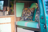 A VW T5 Campervan called Pretty-Green and for hire in Hickstead, West Sussex