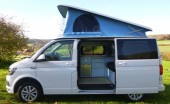 A  Campervan called Edi and Edi roof up for hire in Watford, Hertfordshire