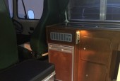A VW T2 Classic Campervan called Wild-Monty and Funky Interior with storage boxseat for hire in Bideford, Devon