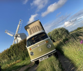A VW T2 Classic Campervan called Winnie-The-Westie and Winnie and the windmill for hire in Canterbury, Kent