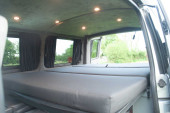 A VW T5 Campervan called Romper-Swamper and for hire in Hickstead, West Sussex