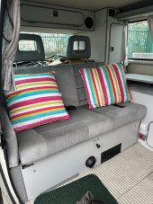 A VW T5 Campervan called Blanch-Westfalia and Ample leg room by day, spacious bedding by night for hire 
