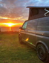 A VW T6 Campervan called Swampy and Swampy in the sunset for hire 
