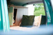 A VW T5 Campervan called Pretty-Green and for hire in Hickstead, West Sussex