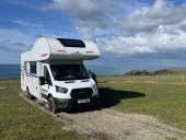 A OverCab Motorhome called panda and for hire in Sittingbourn, Kent