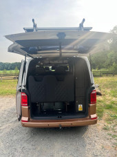 A VW T6 Campervan called T6-4Motion and Rear with Tailgate open for hire in , Kent