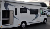 A OverCab Motorhome called Jim and for hire 