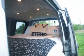 A VW T5 Campervan called Romper-Swamper and for hire in Hickstead, West Sussex