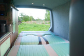 A VW T5 Campervan called Pretty-Green and for hire in Hickstead, West Sussex