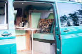 A VW T5 Campervan called Pretty-Green and for hire in Hickstead, West Sussex