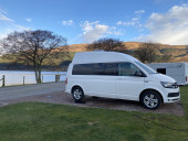A VW T6 Campervan called Alpina-1224 and Side view for hire in Cumbria, Cumbria