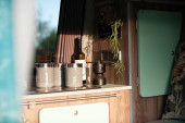 A VW T5 Campervan called Pretty-Green and for hire in Hickstead, West Sussex